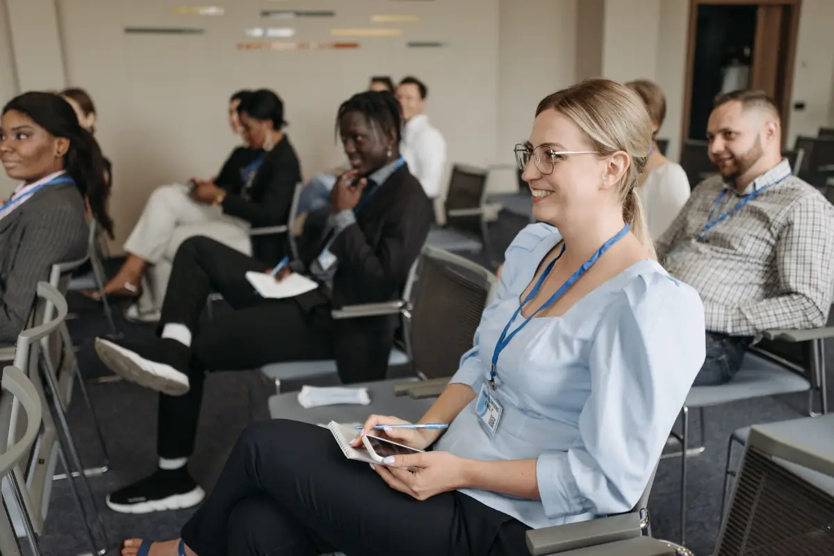 An image of a group of people attending a seminar