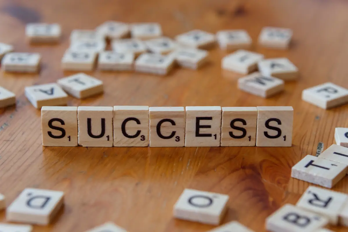 An image of scrabble pieces spelling the word 'success'